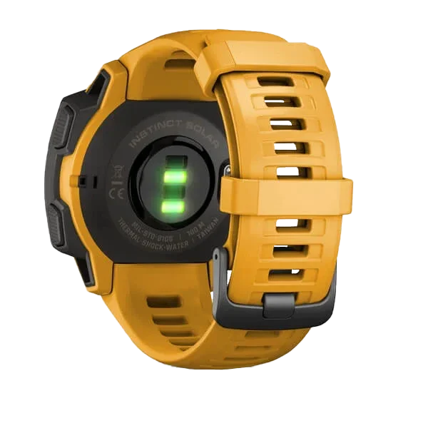 Garmin Instinct Solar Sunburst smartwatch with orange band; back shows green charging indicator