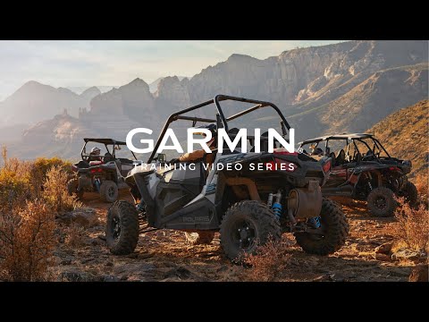 Garmin Tread Powersport GPS with Ride Radio on three rugged off-road UTVs in a desert canyon