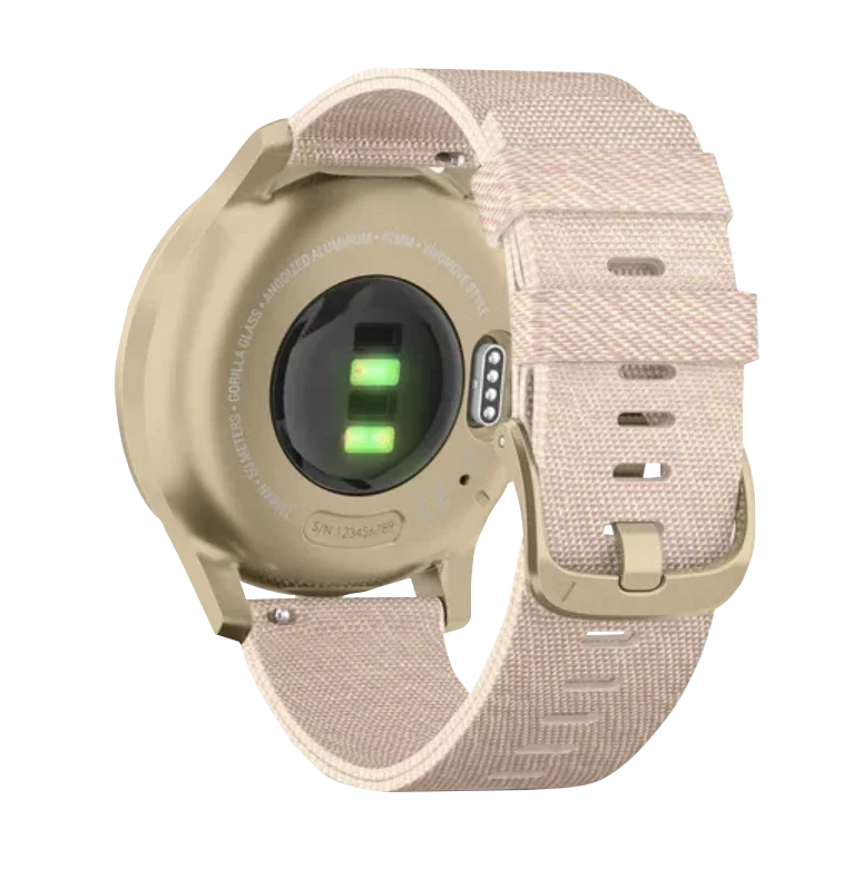Garmin Vívomove Style smart watch with a light gold aluminum case and blush pink woven nylon band
