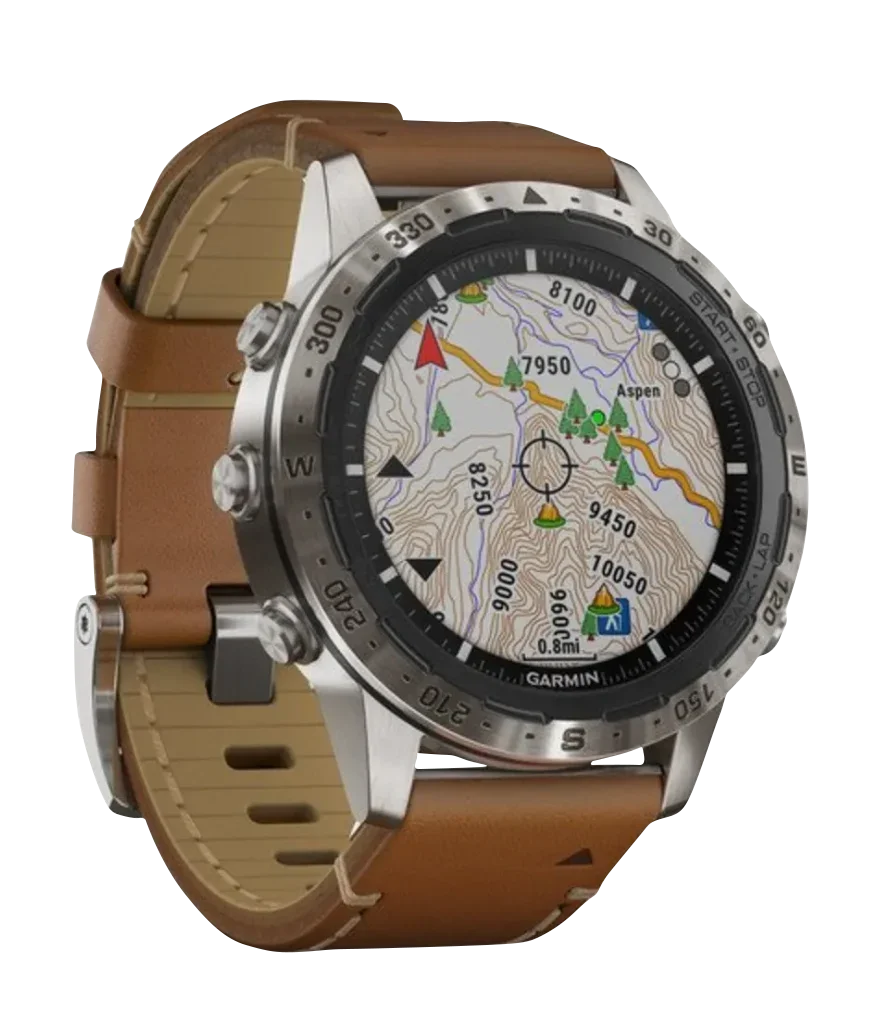 Garmin MARQ Adventurer smartwatch with brown leather strap, silver case, and detailed topographic map display.