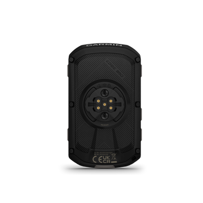 Garmin Edge 850 device-only rear view; black bicycle computer with gold charging pins and Garmin logo strap