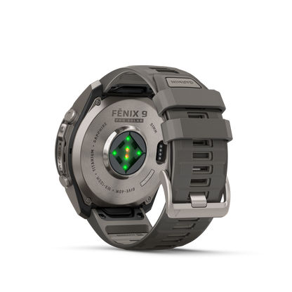 Garmin Fenix 9 Pro Solar titanium smartwatch with gray-silver silicone band, 51mm
