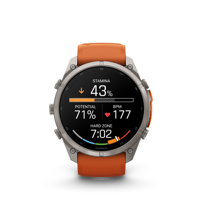 Garmin Fenix 9 Pro AMOLED smartwatch with 51mm titanium case and orange silicone band.