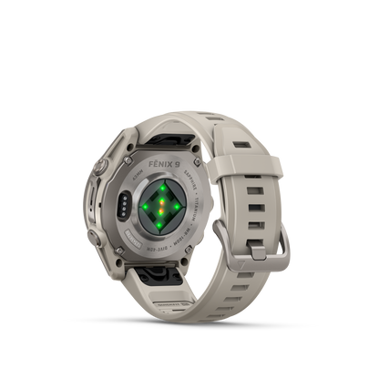 Garmin Fenix 9 AMOLED 43mm titanium smartwatch with gray silicone band, rear sensor array visible.