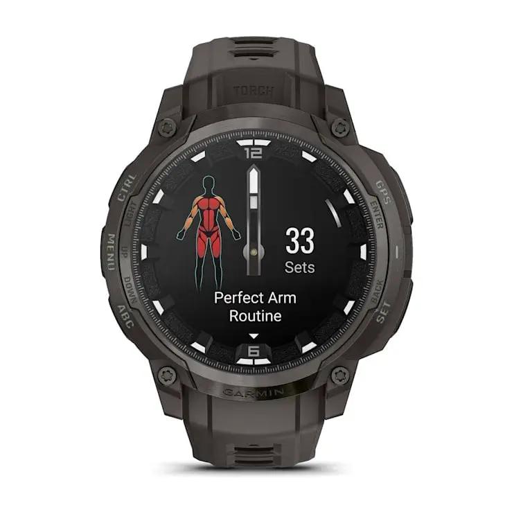 Garmin Instinct Crossover AMOLED smart watch with rugged dark case and round display.