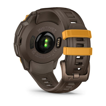 Garmin Instinct Crossover AMOLED transducer with brown case and yellow strap